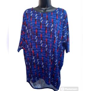 LuLaRoe Shirt XL Disney Cruella de Vil Pattern Blue Short Sleeve Longer in Back